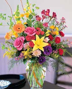Summer Dazzler Bursting with bright colors Durocher FloristWedding